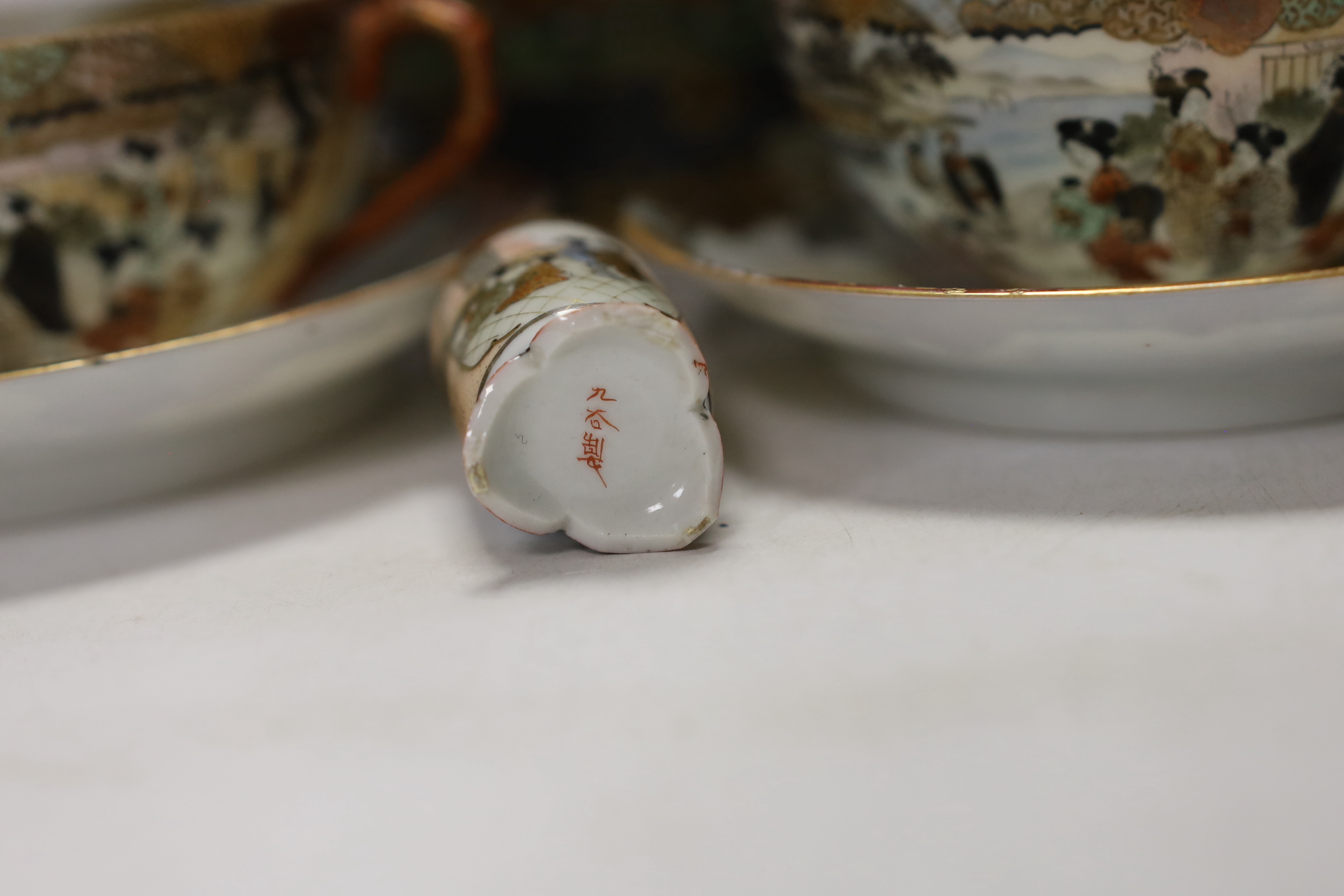 Japanese ceramics including an Imari bottle vase, a Satsuma vase and Kutani eggshell porcelain, tallest 22cm (8)